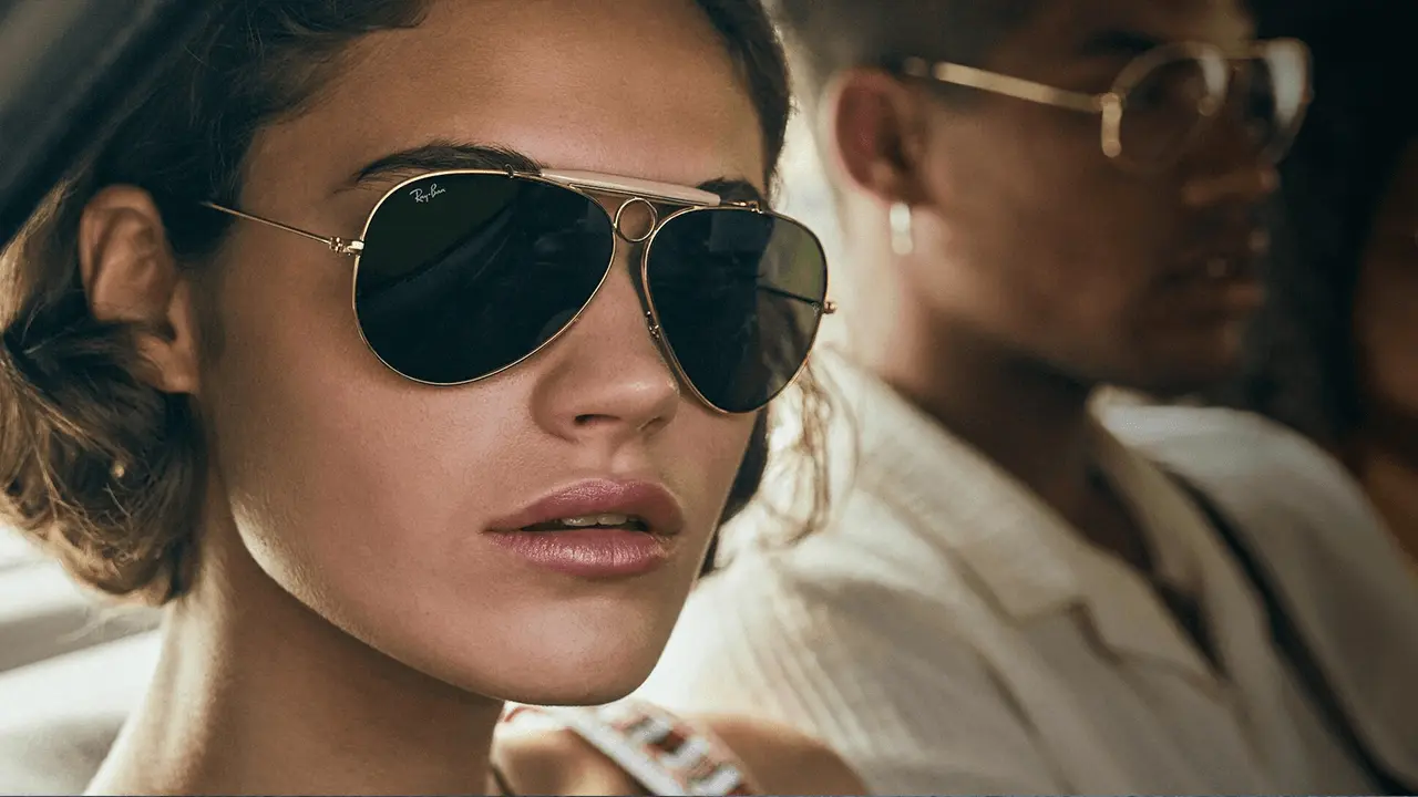 The girl and man wearing Aviator sunglasses